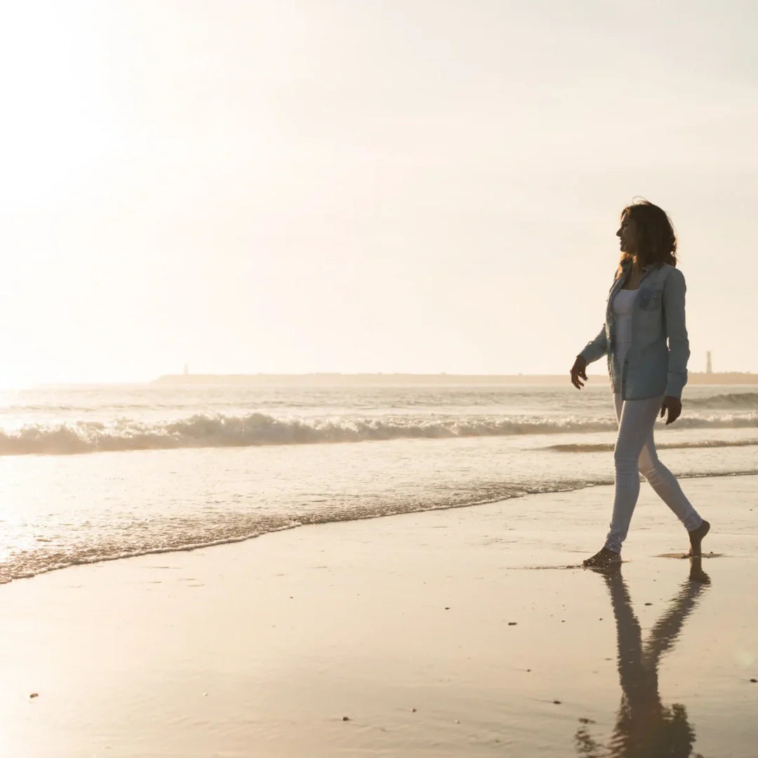 woman walking on the beach