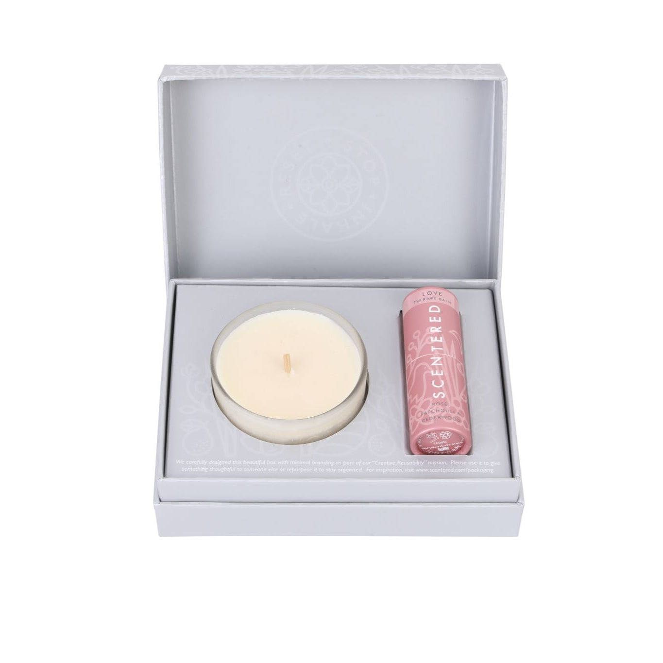 A love balm and a candle packed in a gift box