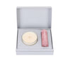 A love balm and a candle packed in a gift box