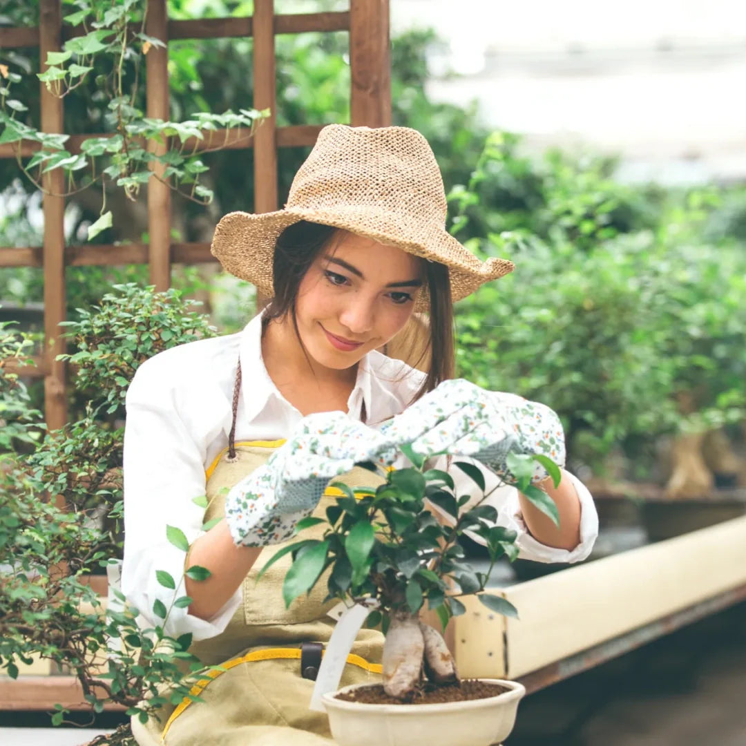 woman holding plant