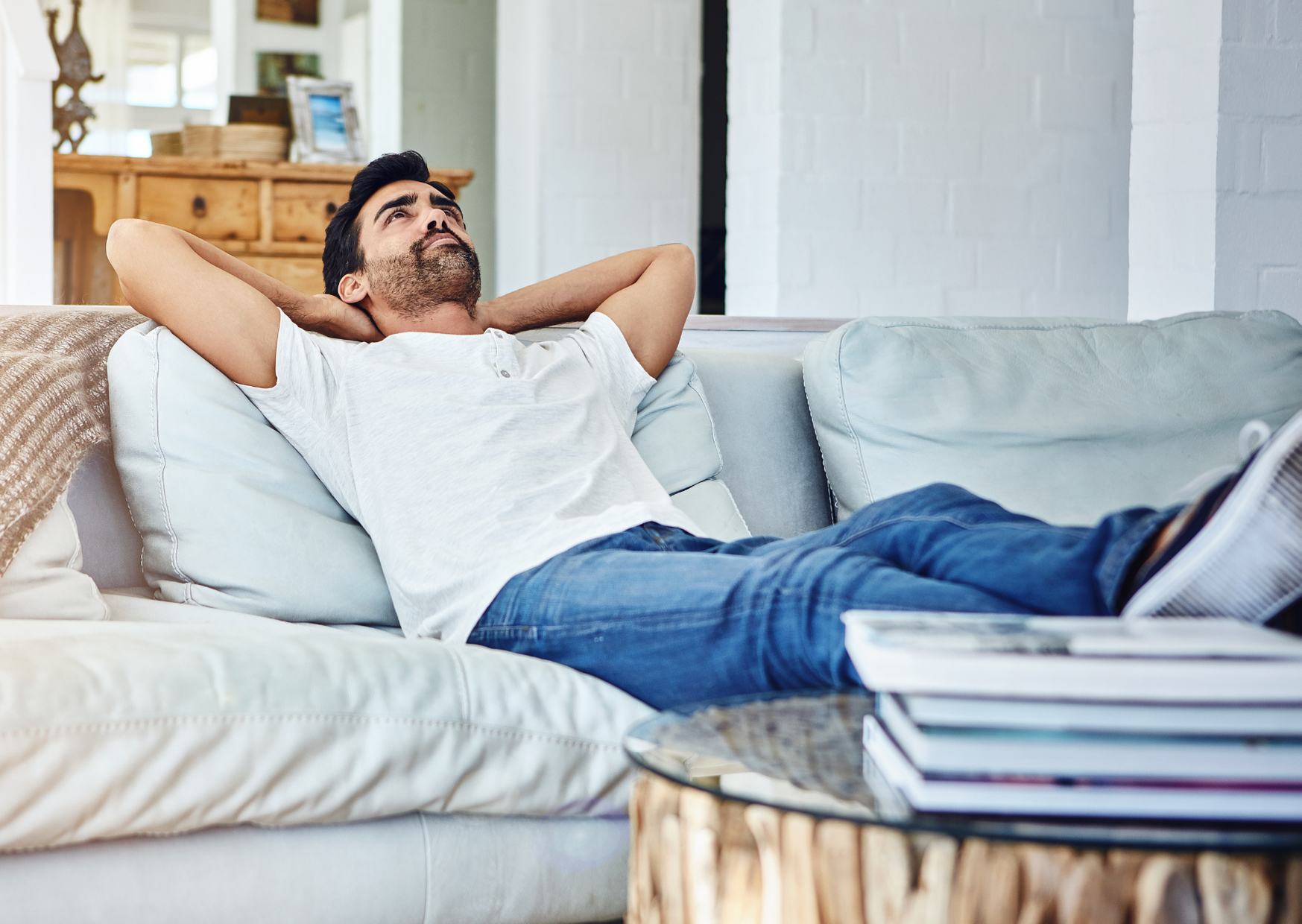 man resting in the sofa
