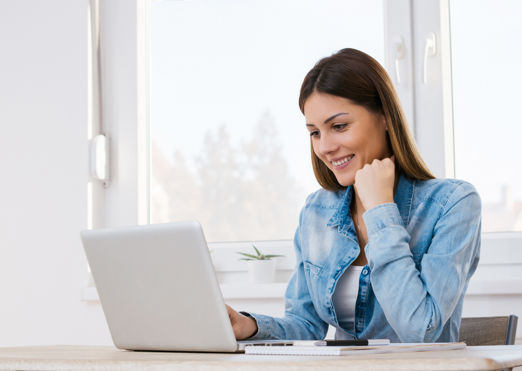 woman working and smiling