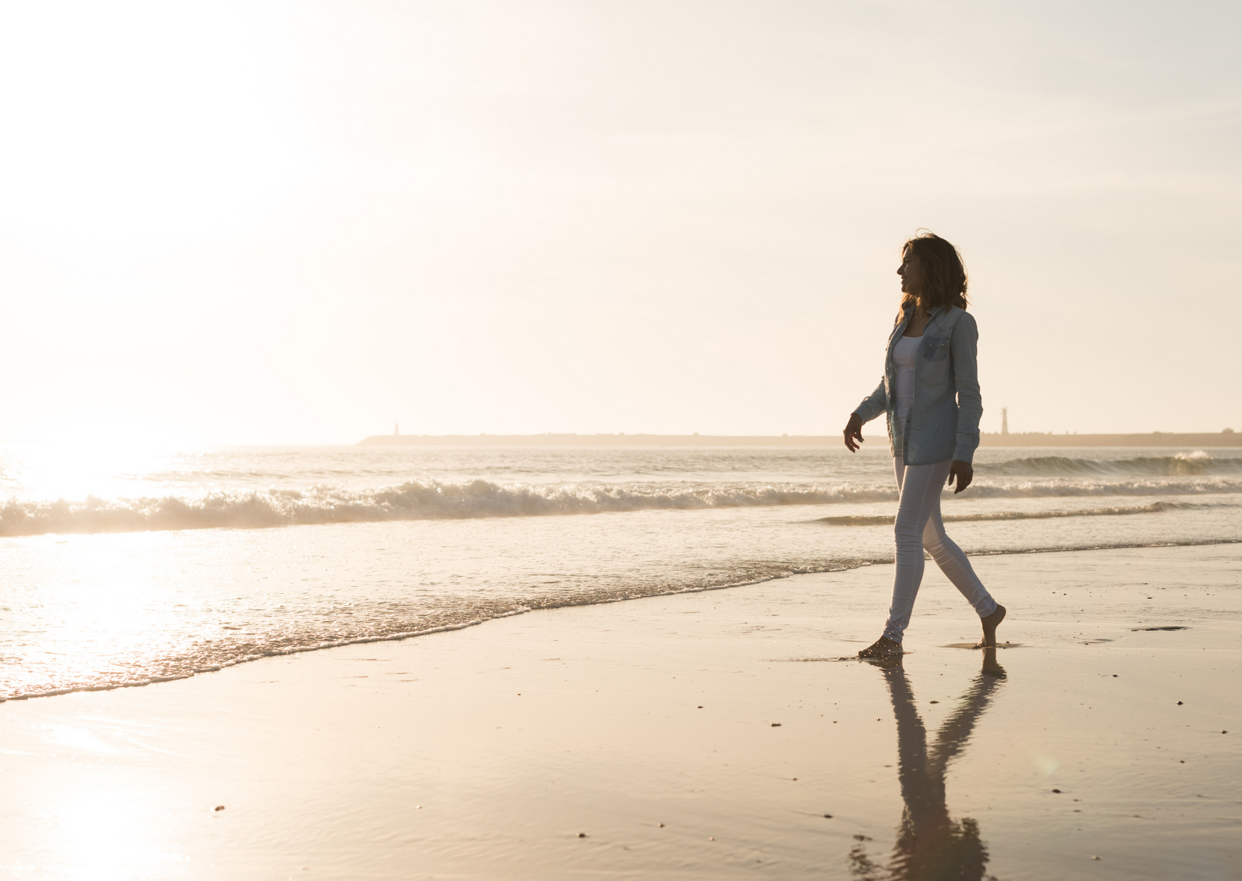 woman walking on the beach