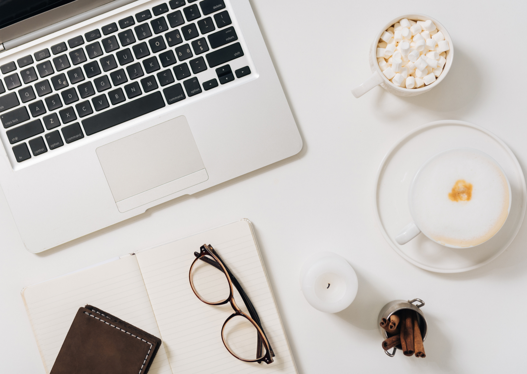 laptop and glasses on a desk