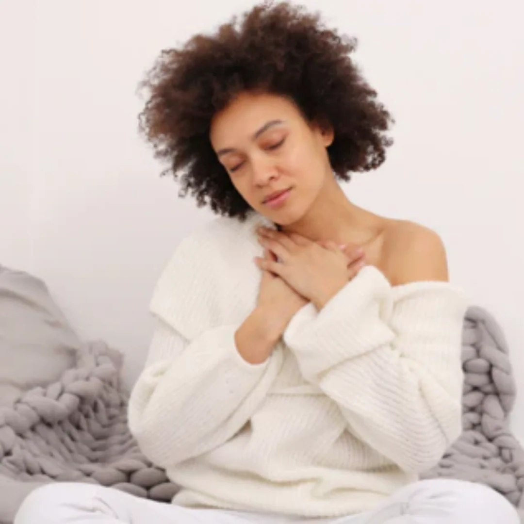 woman relaxing with eyes closed