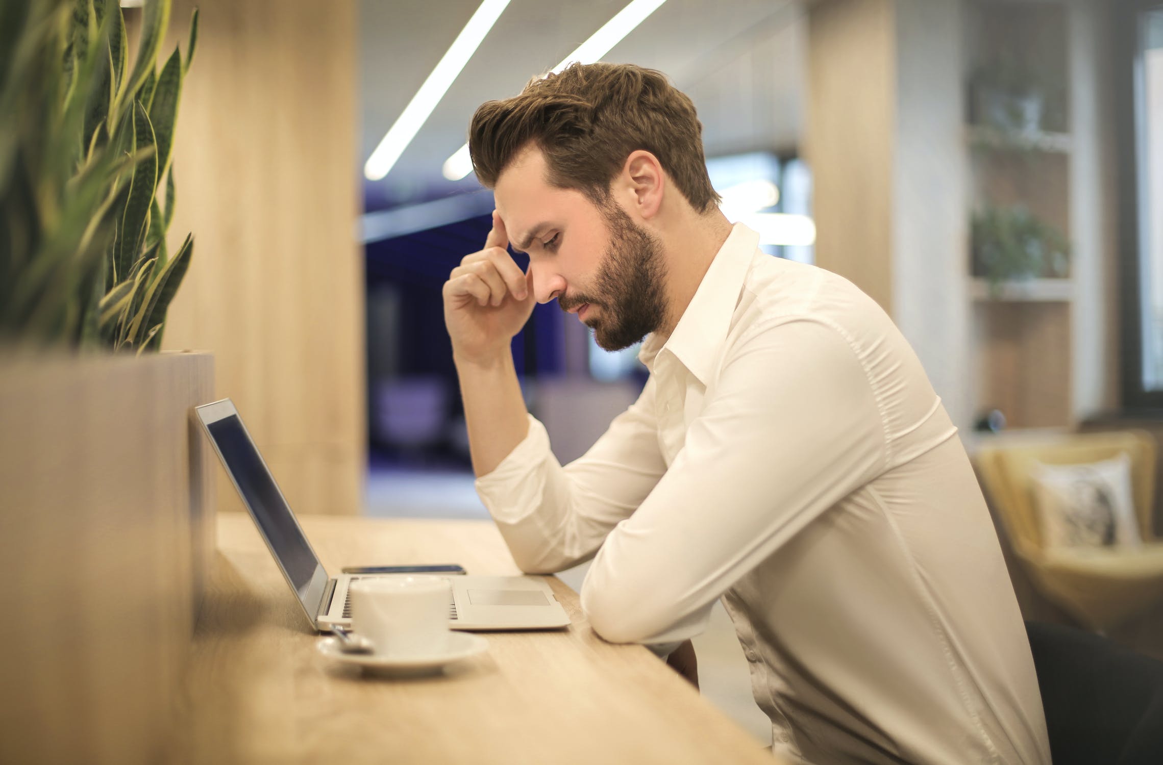 man working looking stressed
