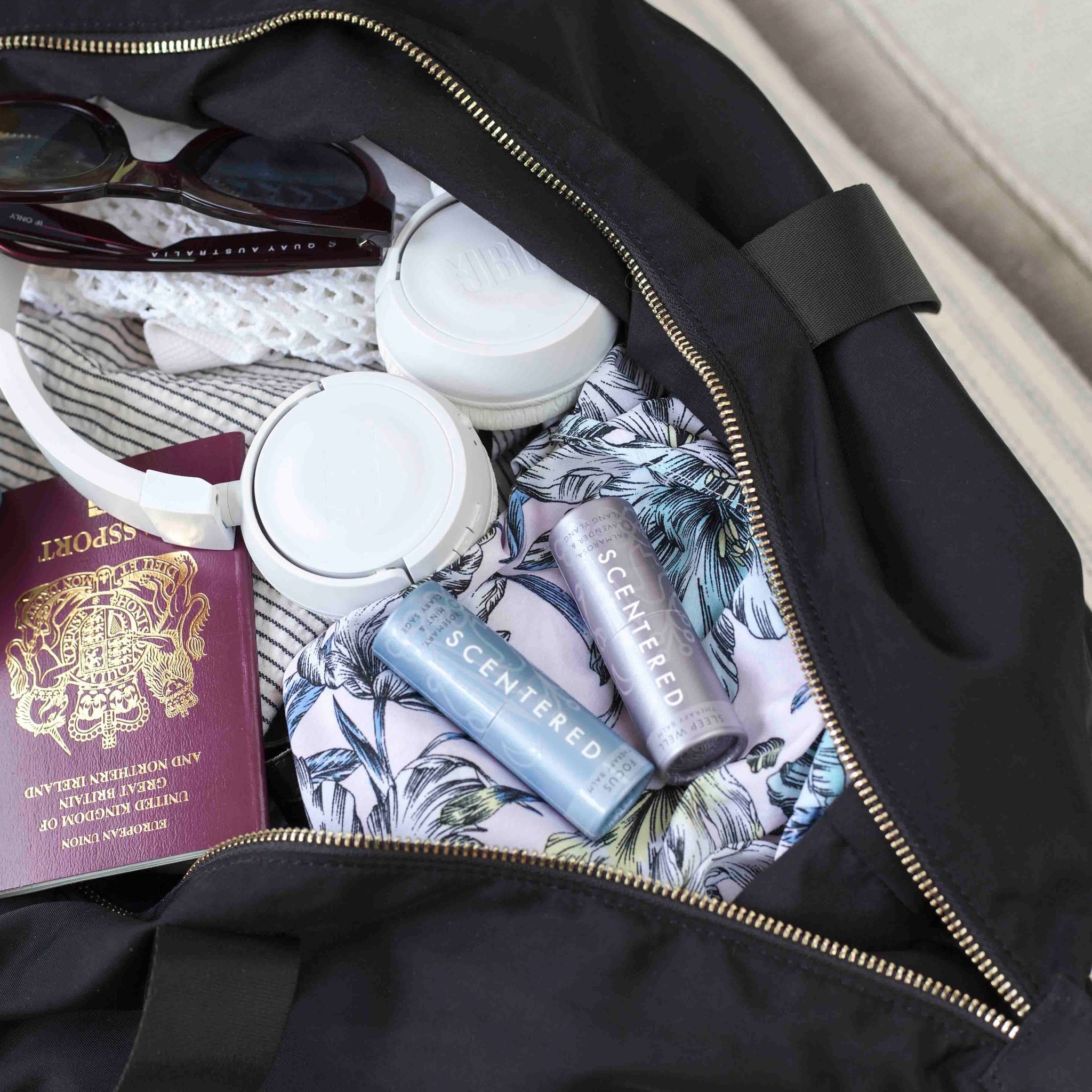 travel essentials including aromatherapy balms