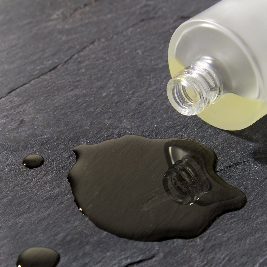Sleep Well Body, Bath & Shower oil open bottle with oil spilling out