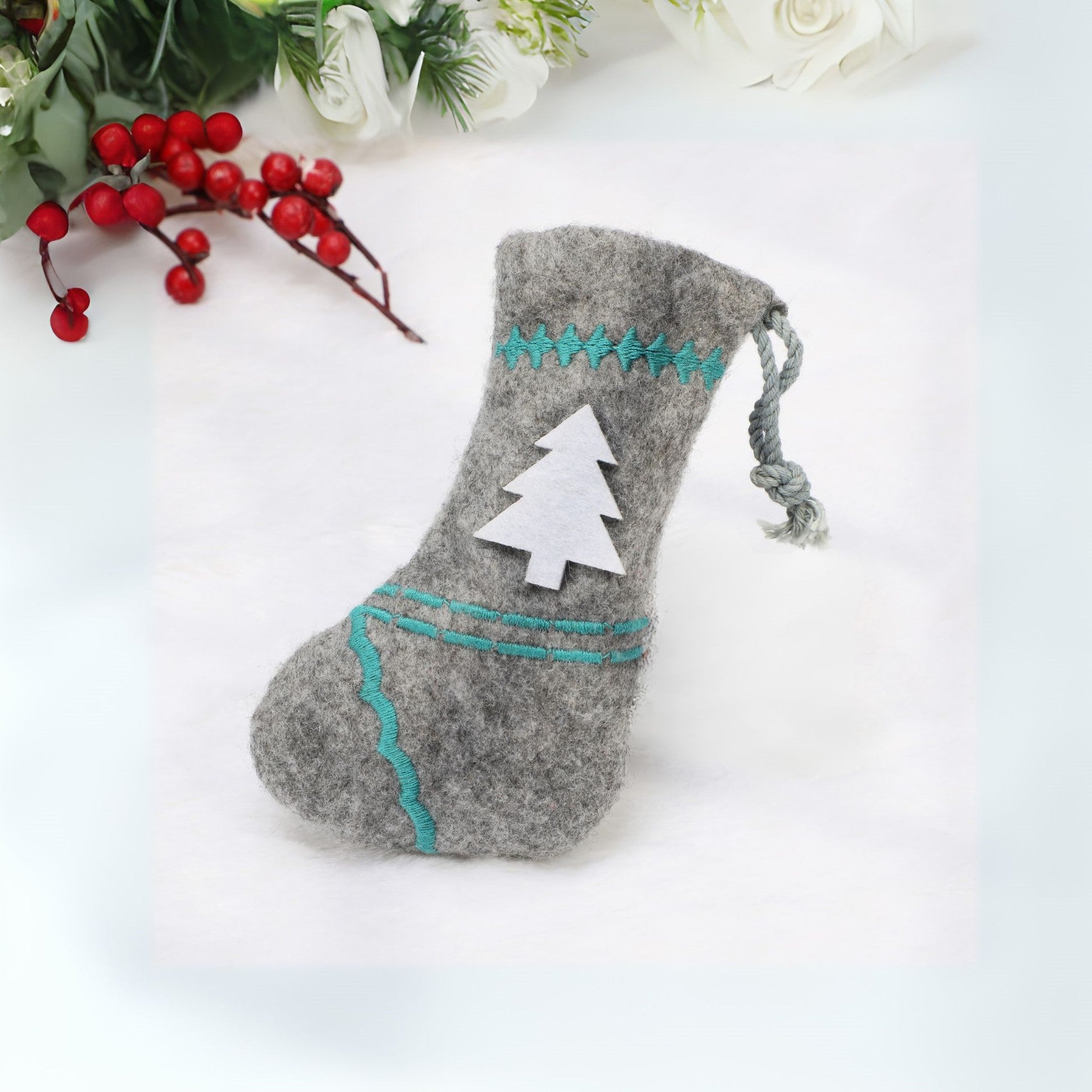 Christmas felt stocking with a fir tree design