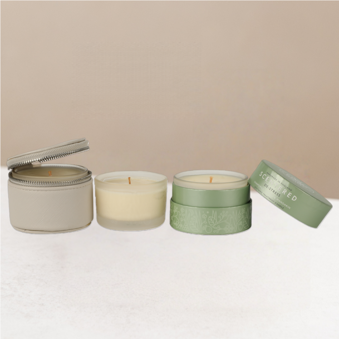 De-stress Duo collection including de-stress candle, a single candle and a travel sized pouch.