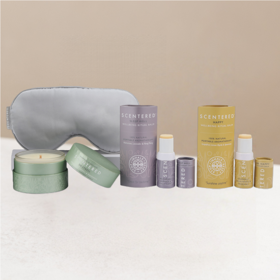 Collection of Scentered Dream & Shine including a sleep eye mask, de-stress candles, happy balm and sleep well balm.