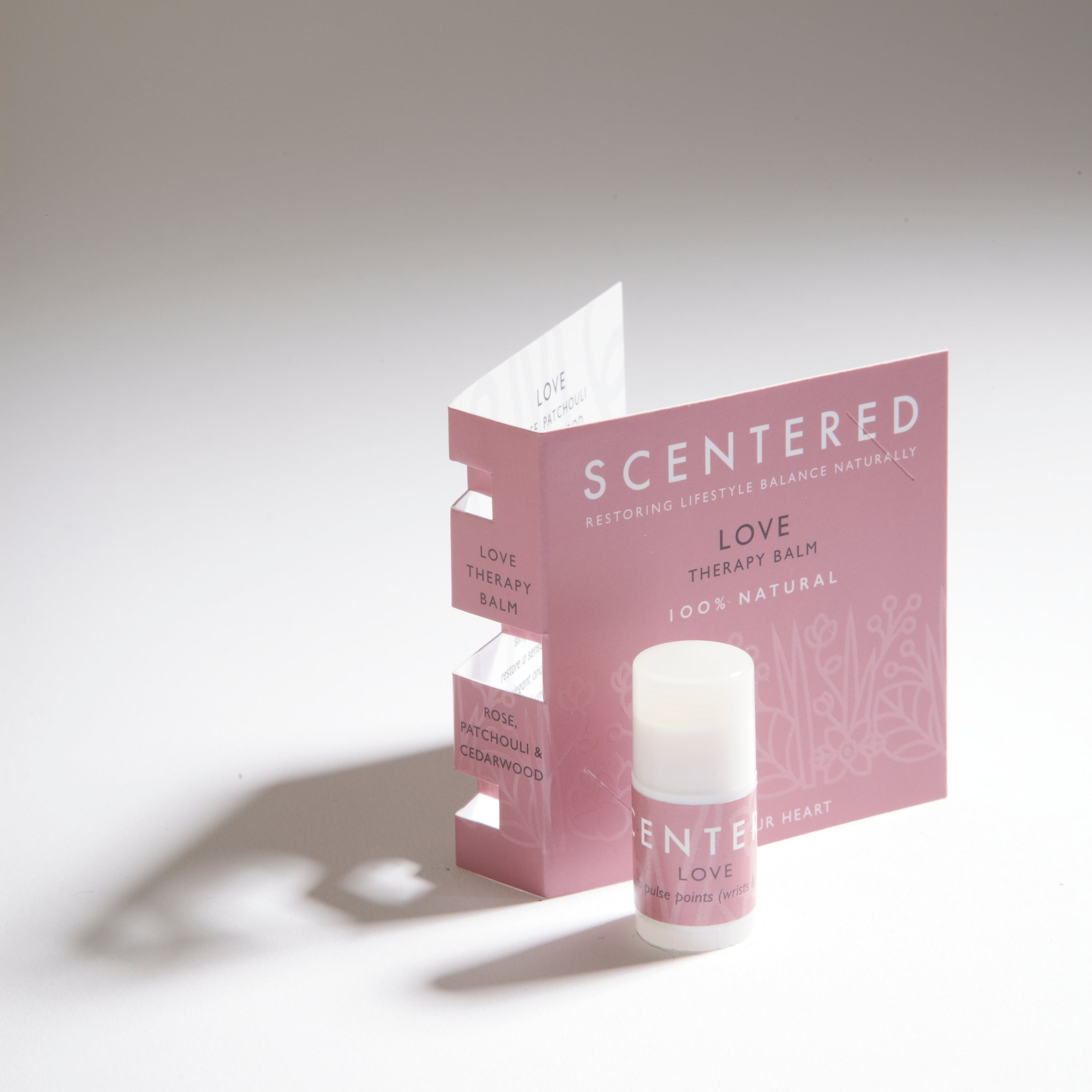 Love mini balm with the pink package