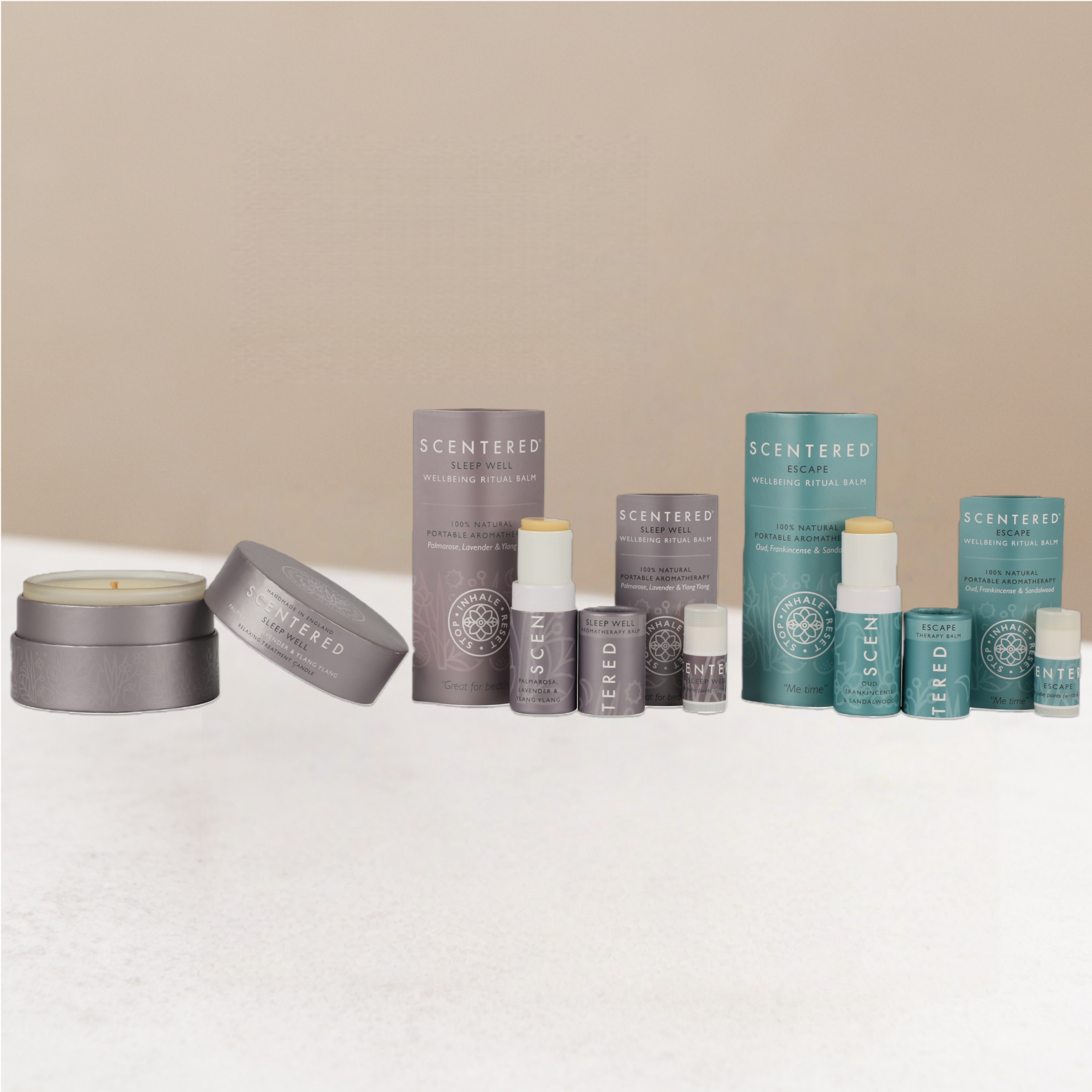 Rest Refocus Collection including sleep well 5g Balm, sleep well 1.5g balm, escape 5g Balm, escape 1.5g Balm and sleep well travel candle.