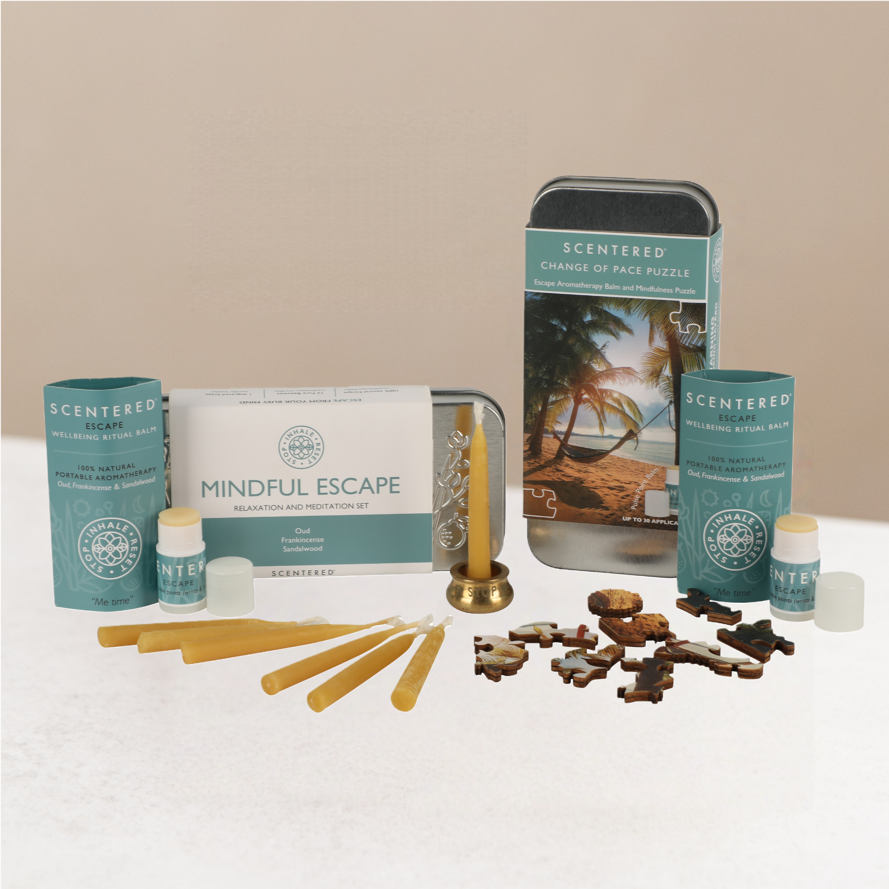 Rest restore collection including escape relaxation, escape change of pace and beeswax mindfulness candles.