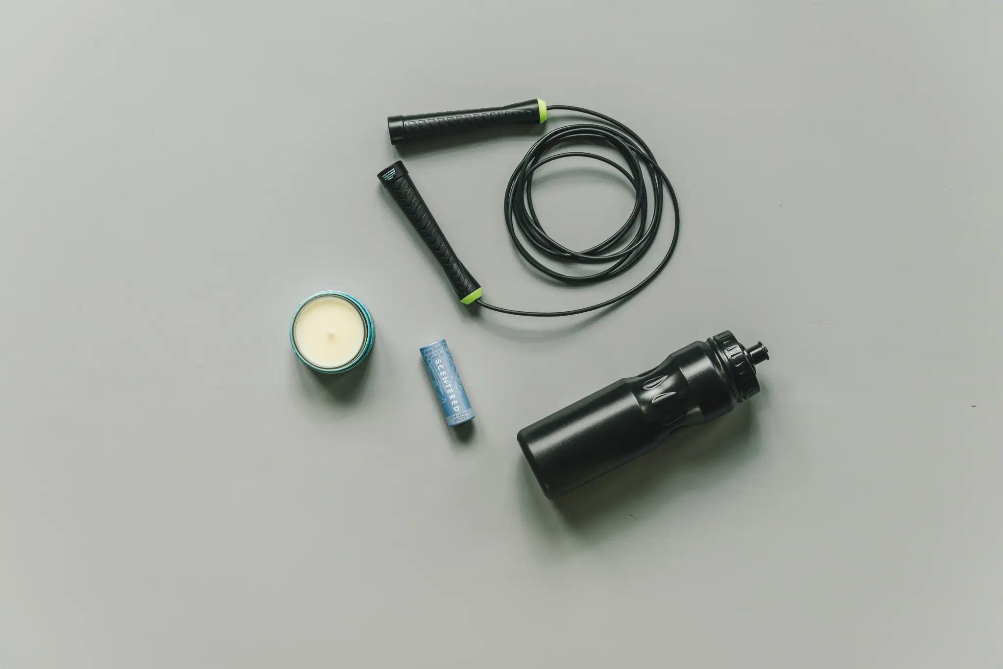 Scentered-focus-balm flat lay wtih water bottle and skipping rope