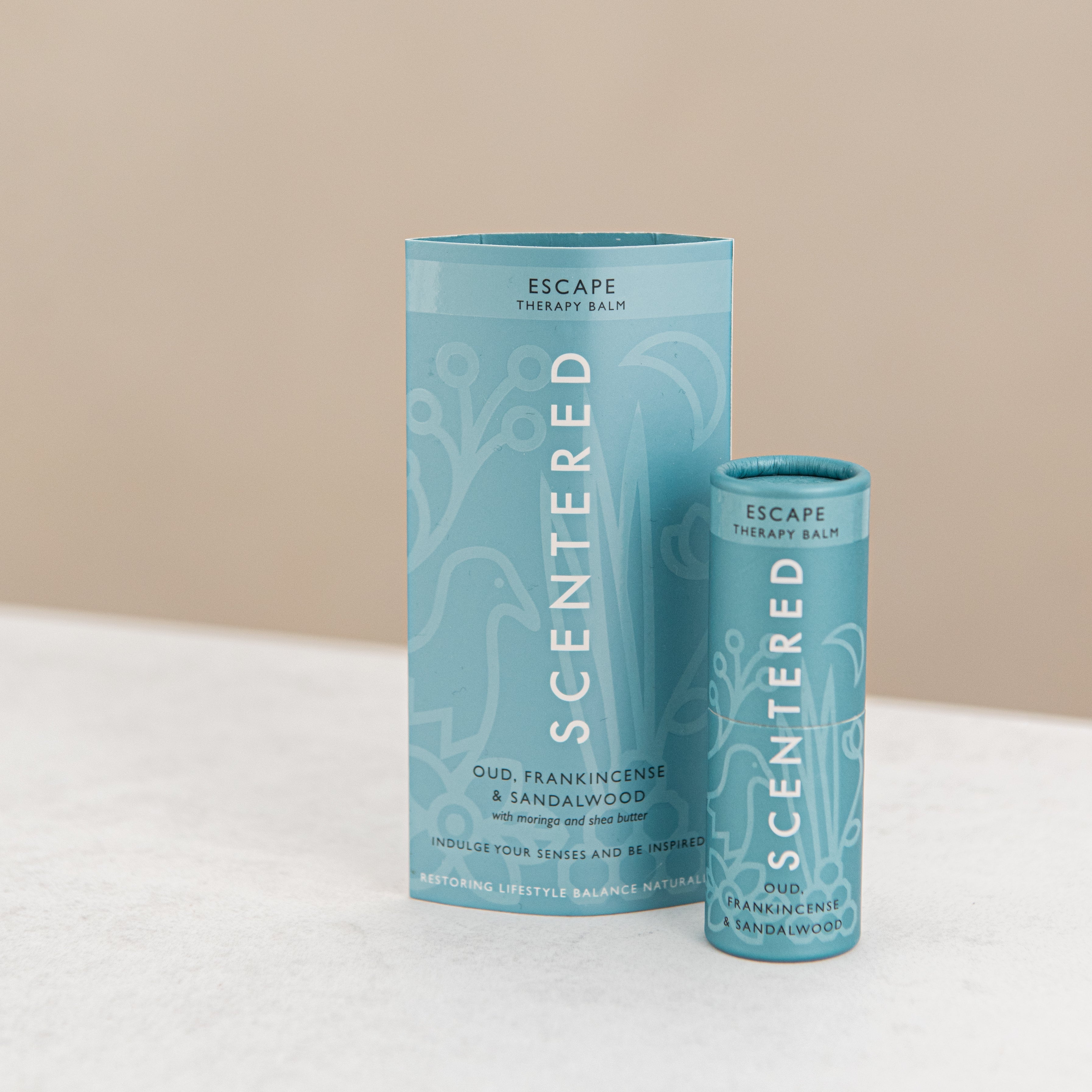 Scented Escape balm with sleeve package