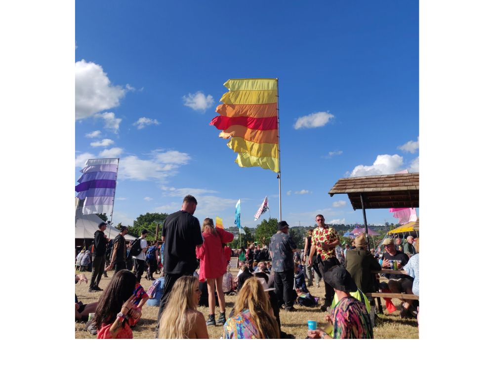 People enjoying Glastonbury festival