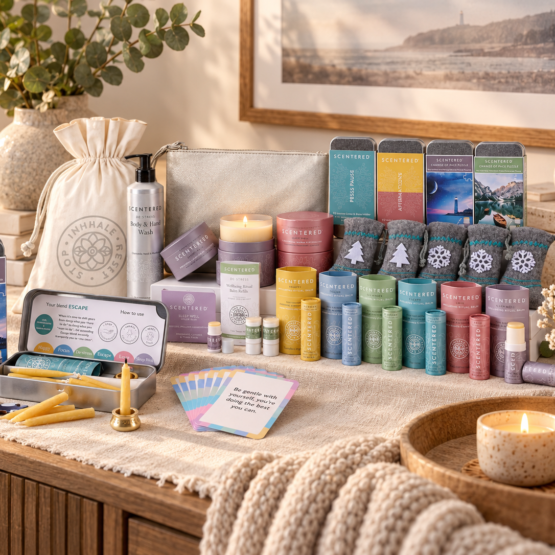 Wellbeing booster box with balms and candles on the desk