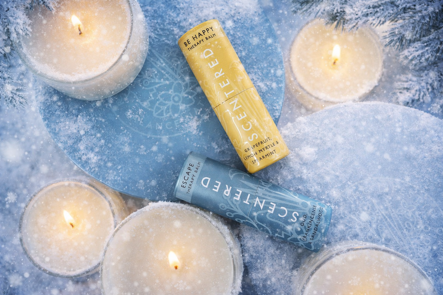 Scentered candles and balms in a snowing image